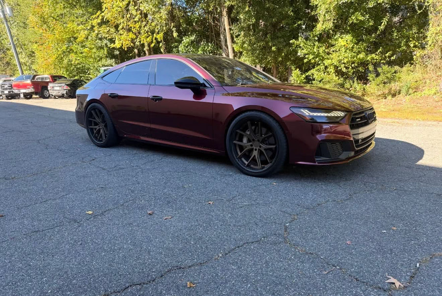 Audi A7 wrapped in a burgundy-to-purple color-shift gloss finish