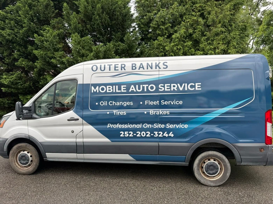 Outer Banks Mobile Auto Service van, full side view of the blue and silver wrap